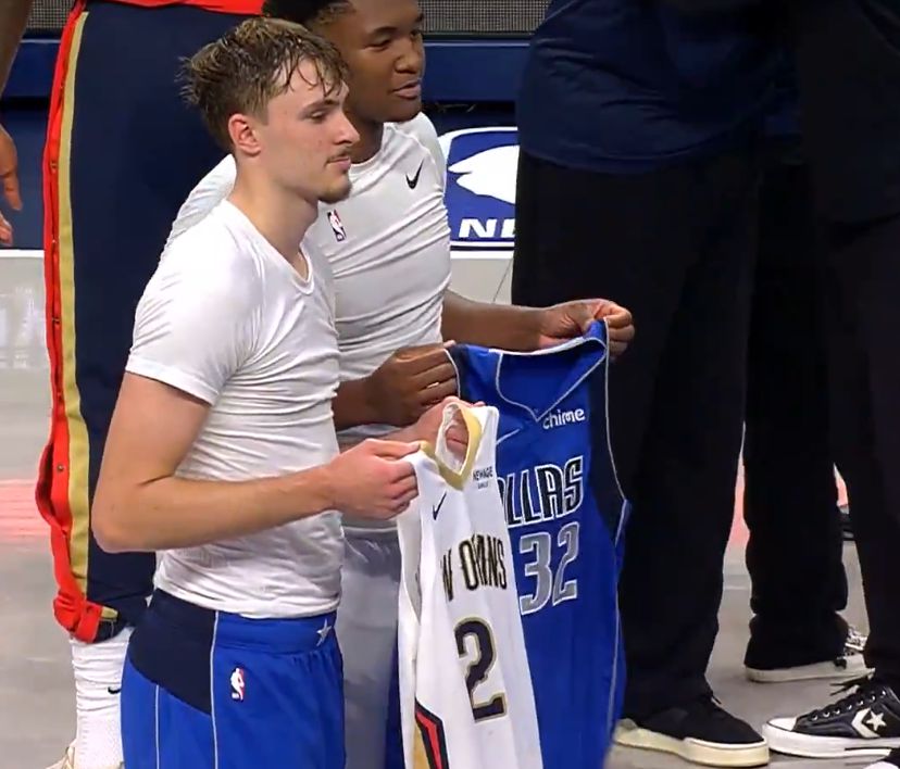 High school teammates! Flagg and Quinn swap uniforms after the game